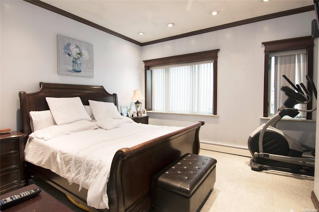 bedroom with crown molding and a baseboard heating unit