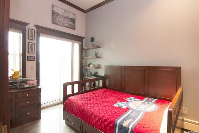 bedroom with hardwood / wood-style flooring and ornamental molding