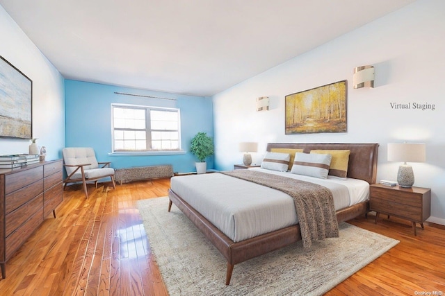 bedroom featuring light wood-type flooring