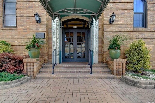 entrance to property featuring french doors