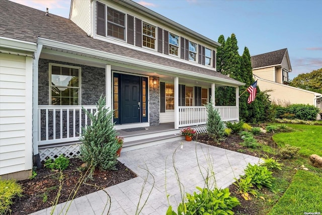 view of front of property featuring a porch