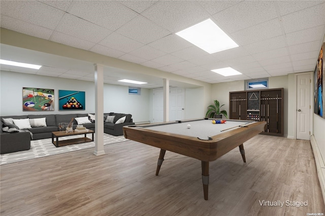 game room with wood-type flooring, a drop ceiling, and pool table