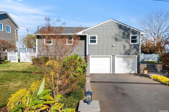 exterior space featuring a yard and a garage