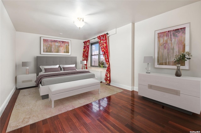 bedroom featuring dark wood-type flooring