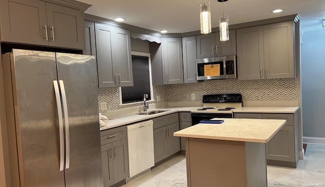 kitchen featuring appliances with stainless steel finishes, tasteful backsplash, a kitchen island, and sink