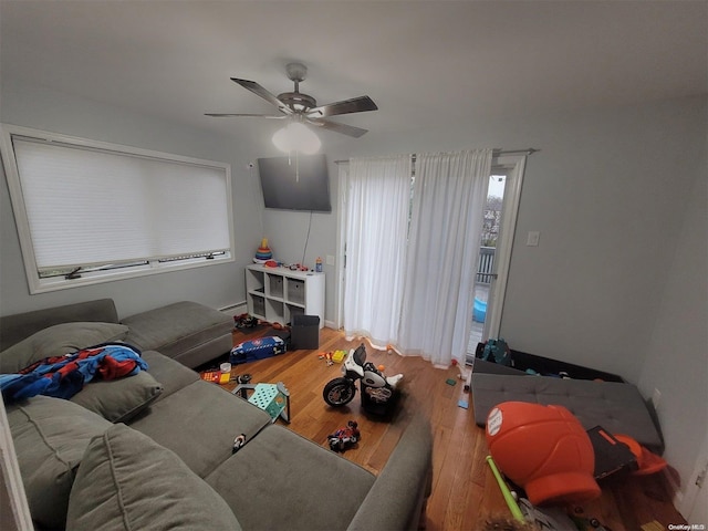 574 Lincoln St, Cedarhurst, NY 11516 - living area featuring ceiling fan and wood finished floors