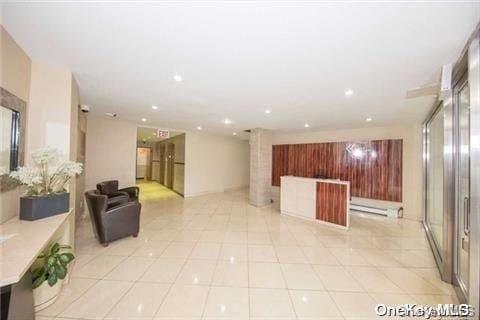 99-60 63rd Rd Unit 7R, Rego Park, NY 11374 - interior space with light tile patterned flooring and recessed lighting