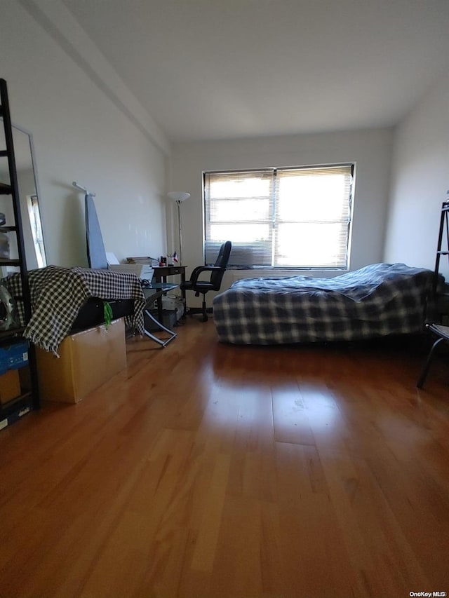 unfurnished bedroom featuring hardwood / wood-style floors