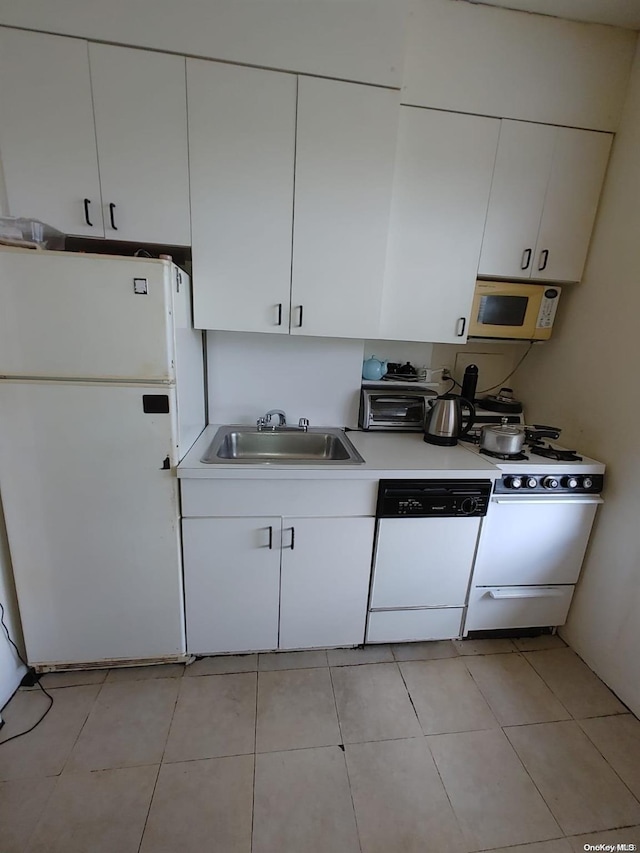 kitchen featuring white cabinetry, white appliances, and sink