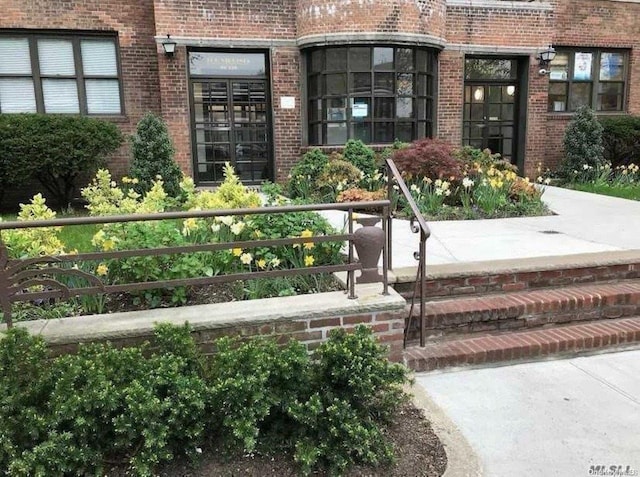 98-120 Queens Blvd Unit 4C, Rego Park, NY 11374 - property entrance with brick siding