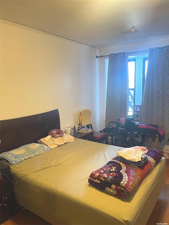 bedroom featuring dark wood-type flooring