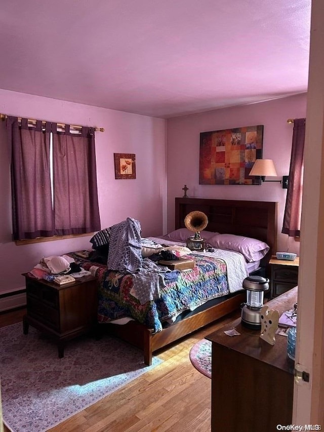 bedroom featuring light wood-type flooring