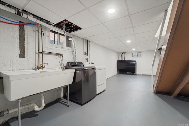 washroom featuring independent washer and dryer and sink