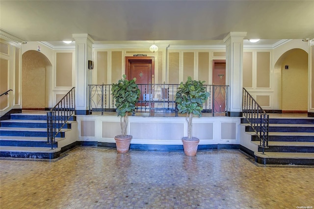 interior space featuring decorative columns