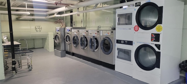 washroom featuring stacked washing maching and dryer and independent washer and dryer