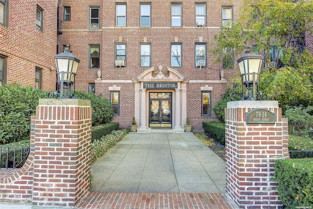 property entrance featuring french doors