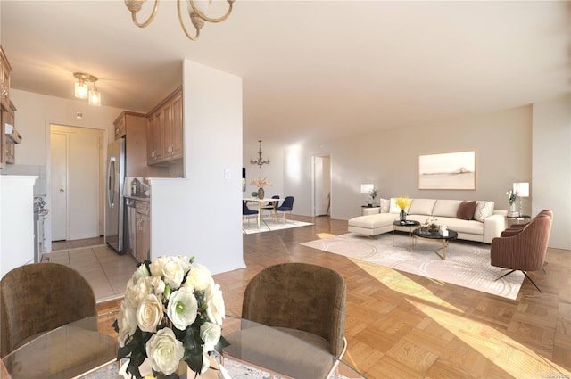 166-25 Powells Cove Blvd Unit 10G, Whitestone, NY 11357 - dining space featuring a chandelier