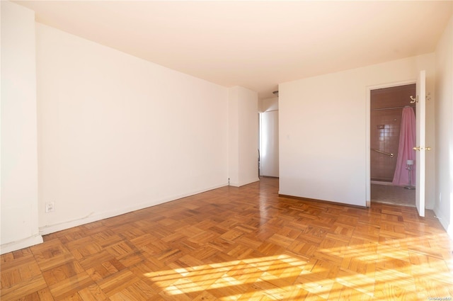 166-25 Powells Cove Blvd Unit 10G, Whitestone, NY 11357 - empty room with baseboards