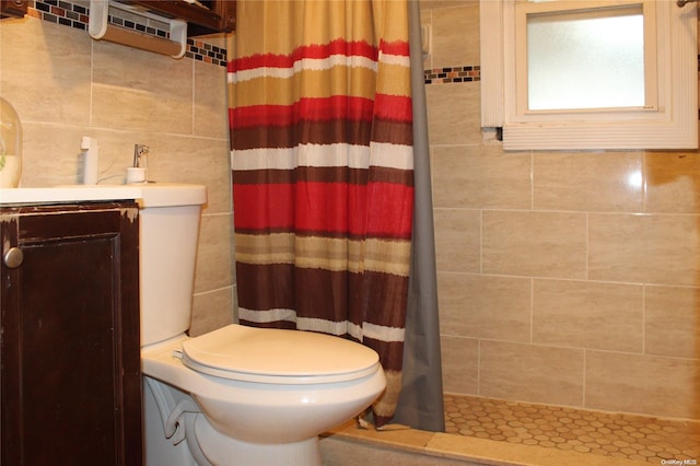 bathroom featuring tasteful backsplash, toilet, tile walls, and a shower with shower curtain