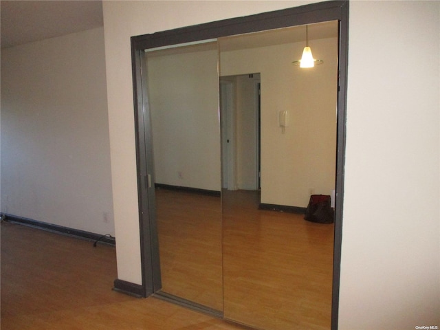 hall featuring hardwood / wood-style flooring