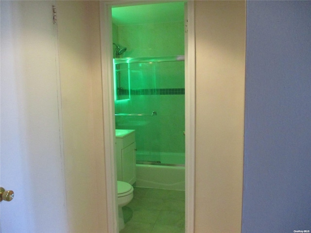 bathroom with tile patterned floors and toilet