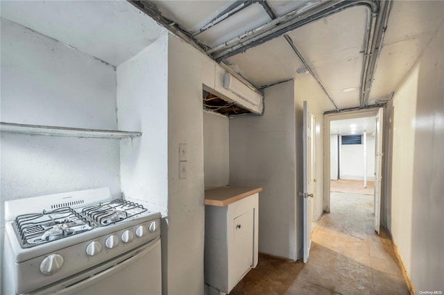 interior space featuring white range with gas stovetop