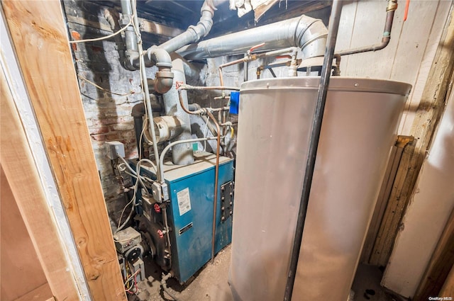 utility room featuring gas water heater