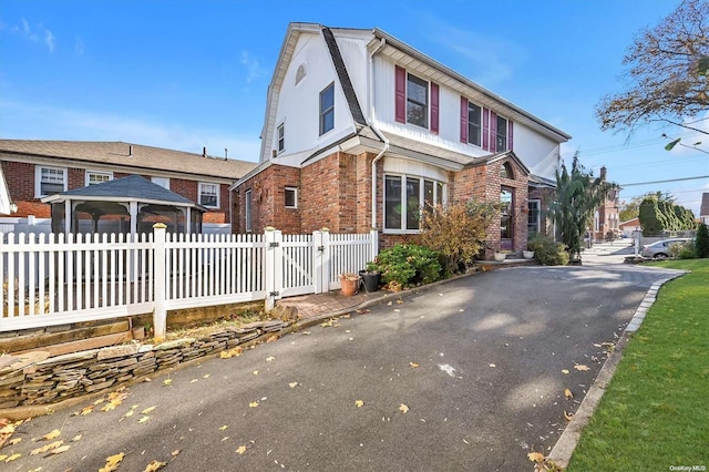 view of front of property with a gazebo