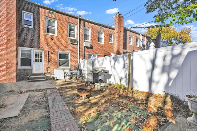 rear view of house with a patio