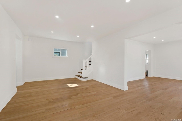 basement featuring light hardwood / wood-style floors