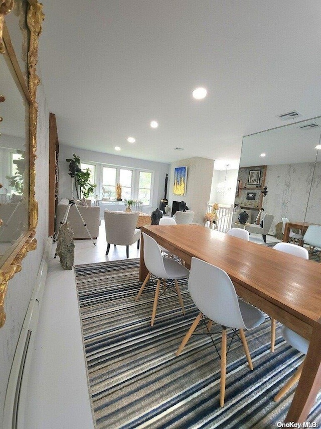 dining space with carpet