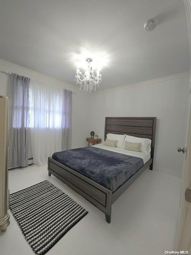 carpeted bedroom featuring ornamental molding, baseboard heating, and a notable chandelier