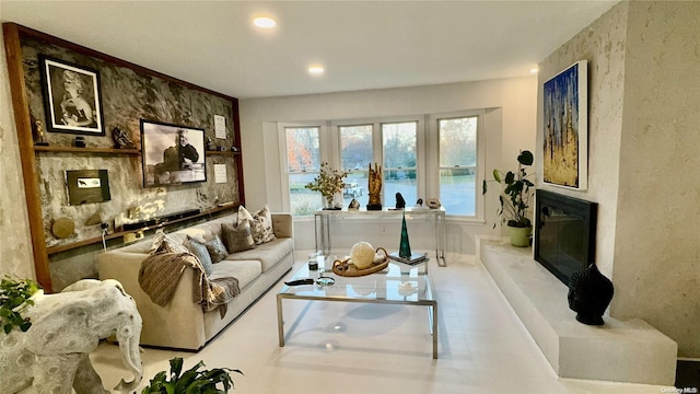 living room featuring a fireplace