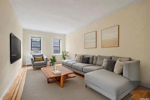 living room featuring parquet flooring