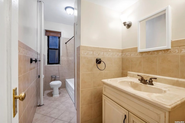 full bathroom featuring tile patterned flooring, vanity, and tile walls