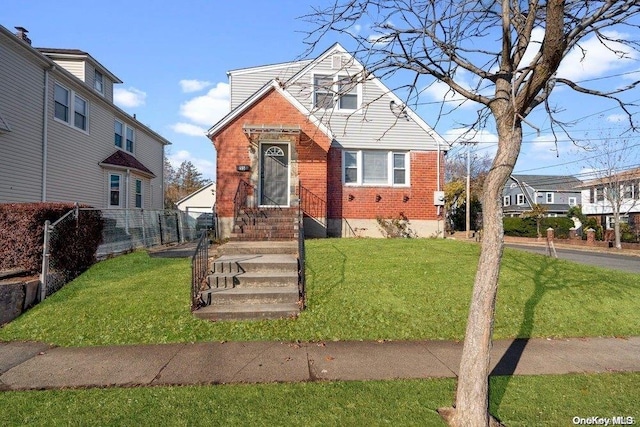 view of front of home with a front lawn