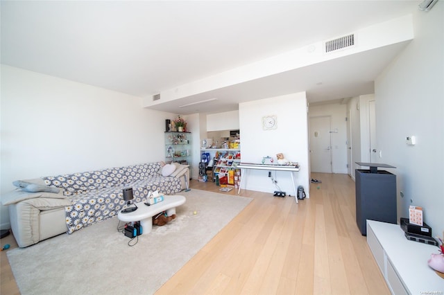 living room with hardwood / wood-style floors