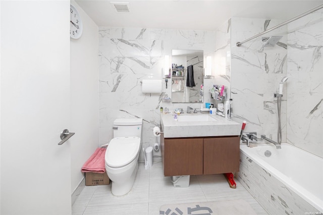 full bathroom with tiled shower / bath combo, toilet, and vanity