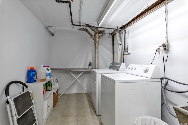 laundry room featuring washer and clothes dryer