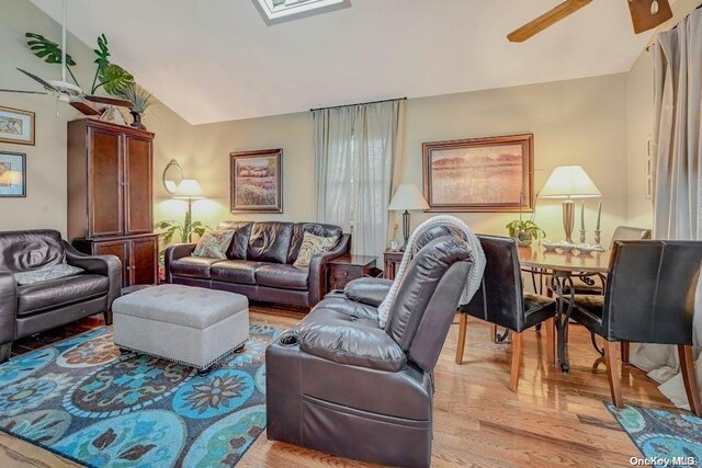 529 Birch Hollow Dr, Shirley, NY 11967 - living room featuring a ceiling fan, light wood-style flooring, and lofted ceiling