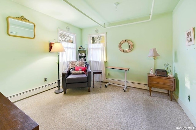 529 Birch Hollow Dr, Shirley, NY 11967 - living area featuring a baseboard radiator and carpet flooring
