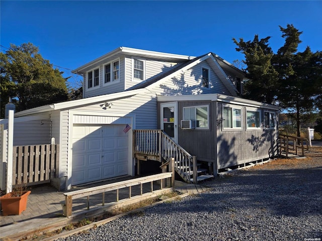 view of front of property featuring a garage