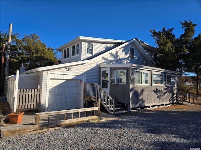 view of front of home featuring a garage