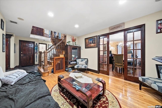 living room featuring hardwood / wood-style floors and french doors