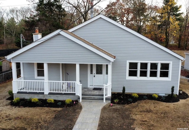 bungalow-style home with covered porch