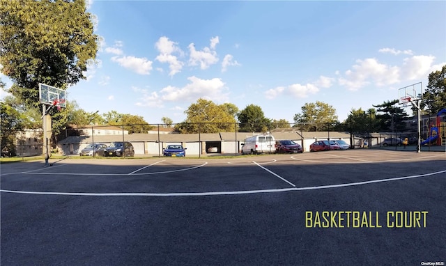 view of sport court featuring community basketball court and fence