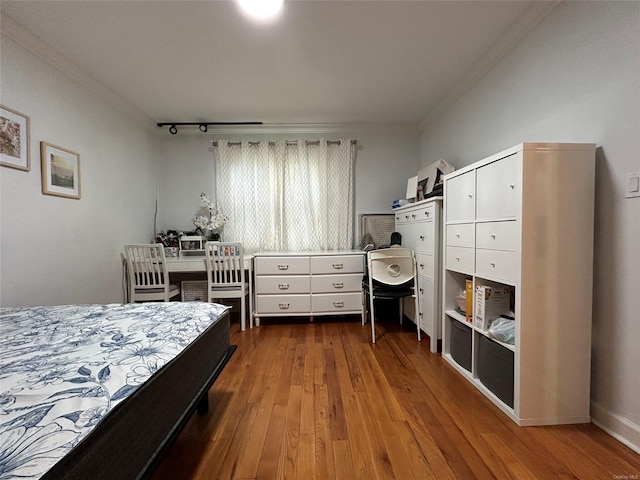 13 W Mill Dr Unit 3A, Great Neck, NY 11021 - bedroom with ornamental molding and wood finished floors