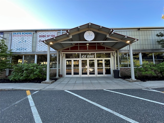 13 W Mill Dr Unit 3A, Great Neck, NY 11021 - view of building exterior with uncovered parking