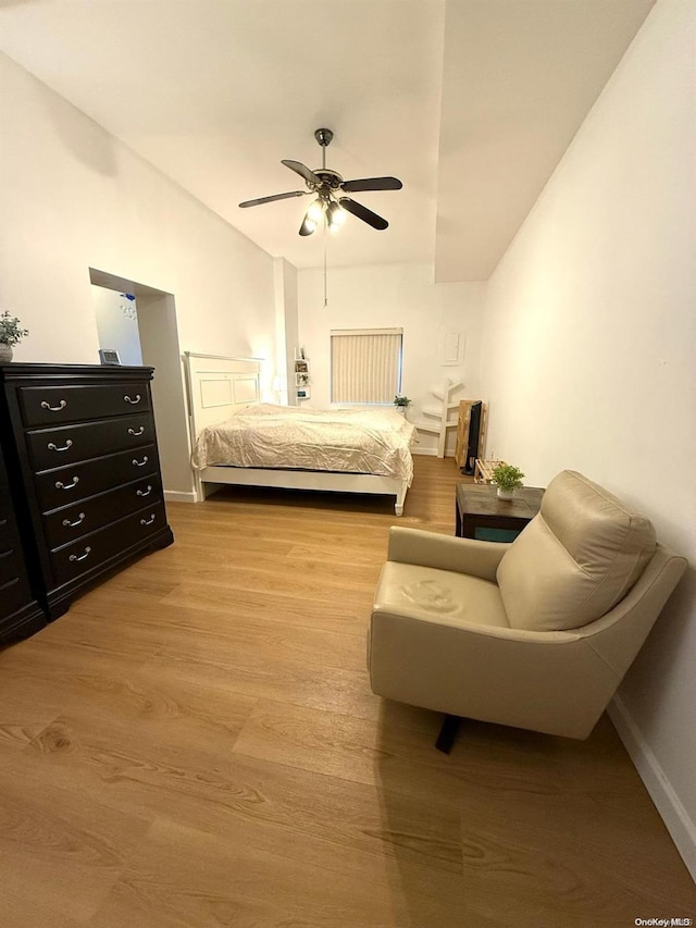 bedroom with light wood-type flooring and ceiling fan