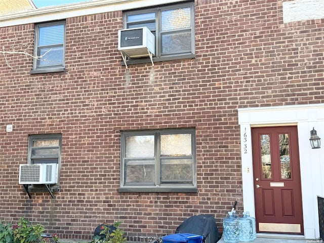 doorway to property with cooling unit